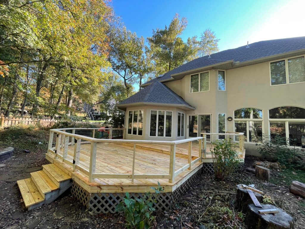 multi tier deck build with cable railings